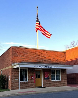 VFW James Madison Post 2217 building in Orange, Virginia, with the American flag.